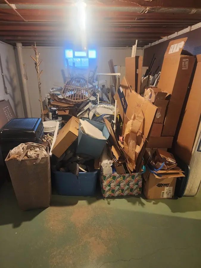 Roll-off dumpster container at job site for 4 Yard Dumpster Rental in Schuyler Falls